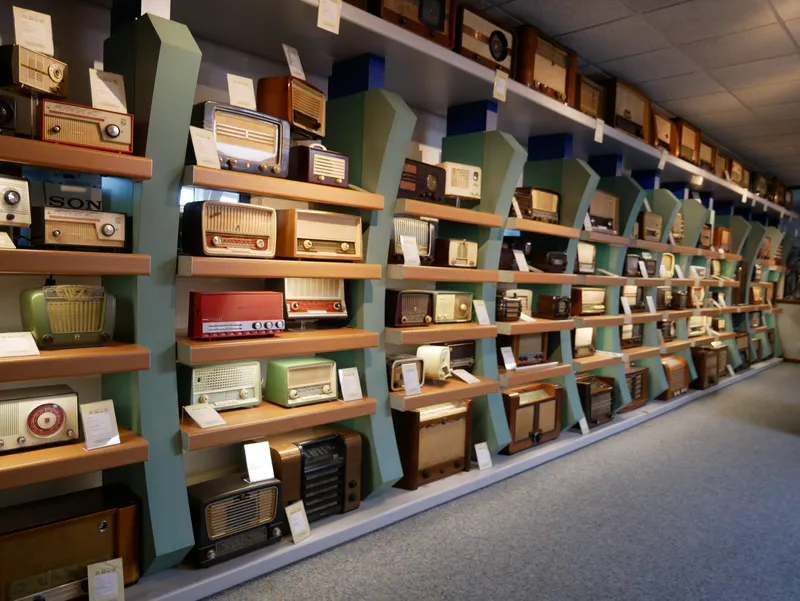 A rack full of vintage radios at the Rotterdam Radio museum
